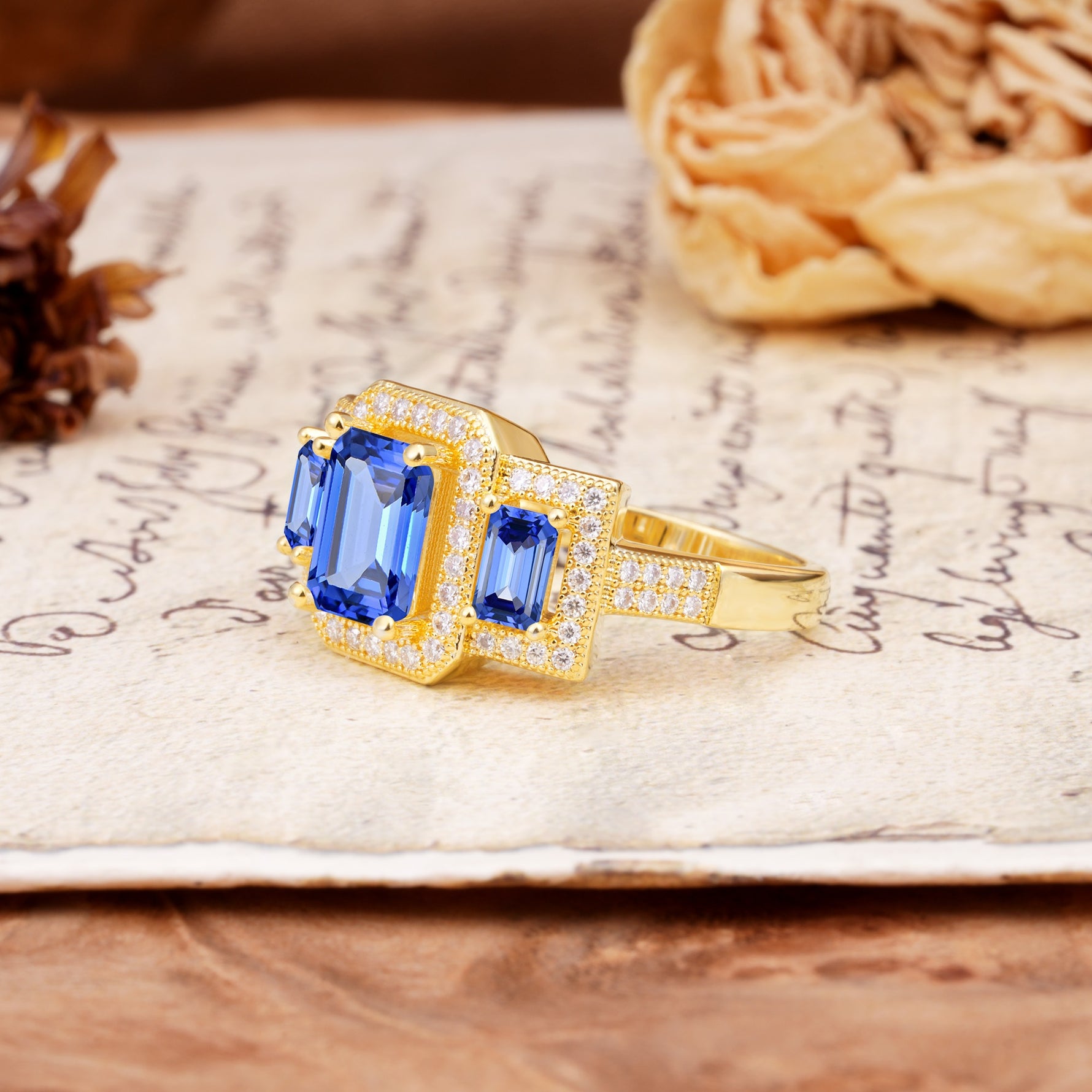 Luxury 4 Prong Emerald CutSapphire Side Stone Engagement Ring - Additional view