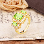 Luxury 4 Prong Emerald CutPeridot Side Stone Engagement Ring - Additional view