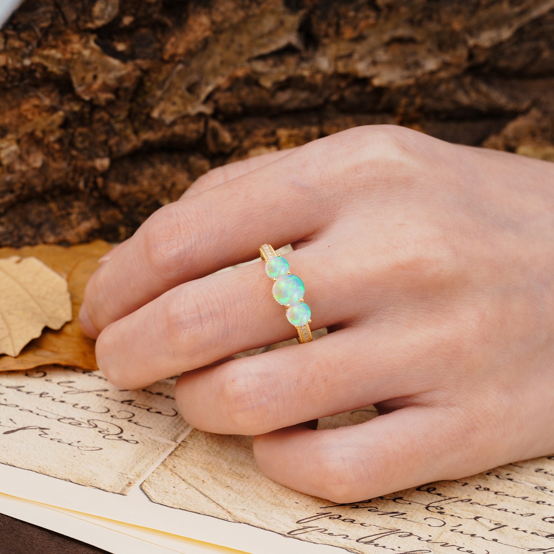 Classic Simplicity 4-Prong Round Cut Fire Opal Three Stones Wedding Ring - Additional view