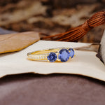Classic Simplicity 4-Prong Round Cut Tanzanite Three Stones Wedding Ring - Additional view