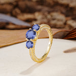 Classic Simplicity 4-Prong Round Cut Tanzanite Three Stones Wedding Ring - Additional view