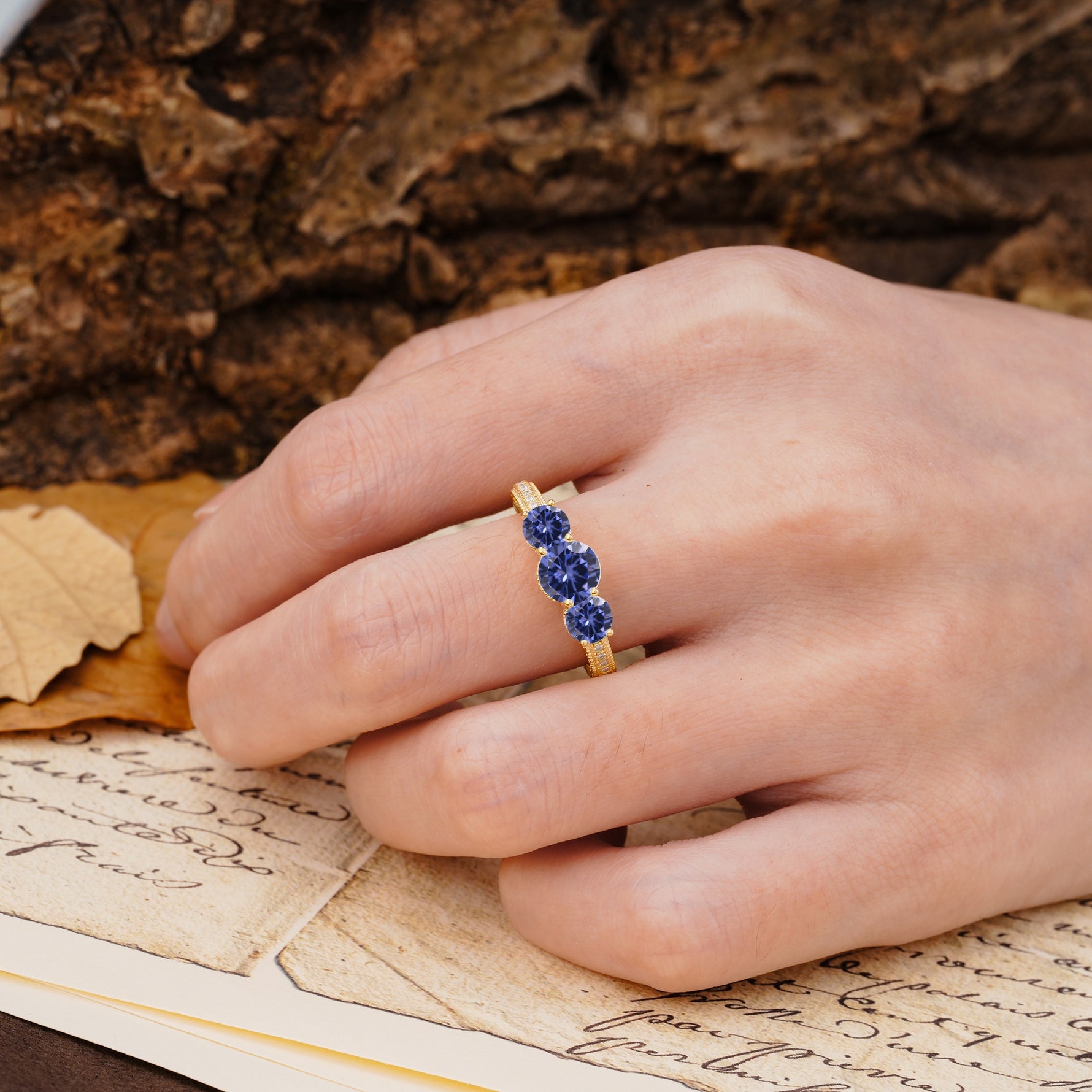 Classic Simplicity 4-Prong Round Cut Tanzanite Three Stones Wedding Ring - Additional view