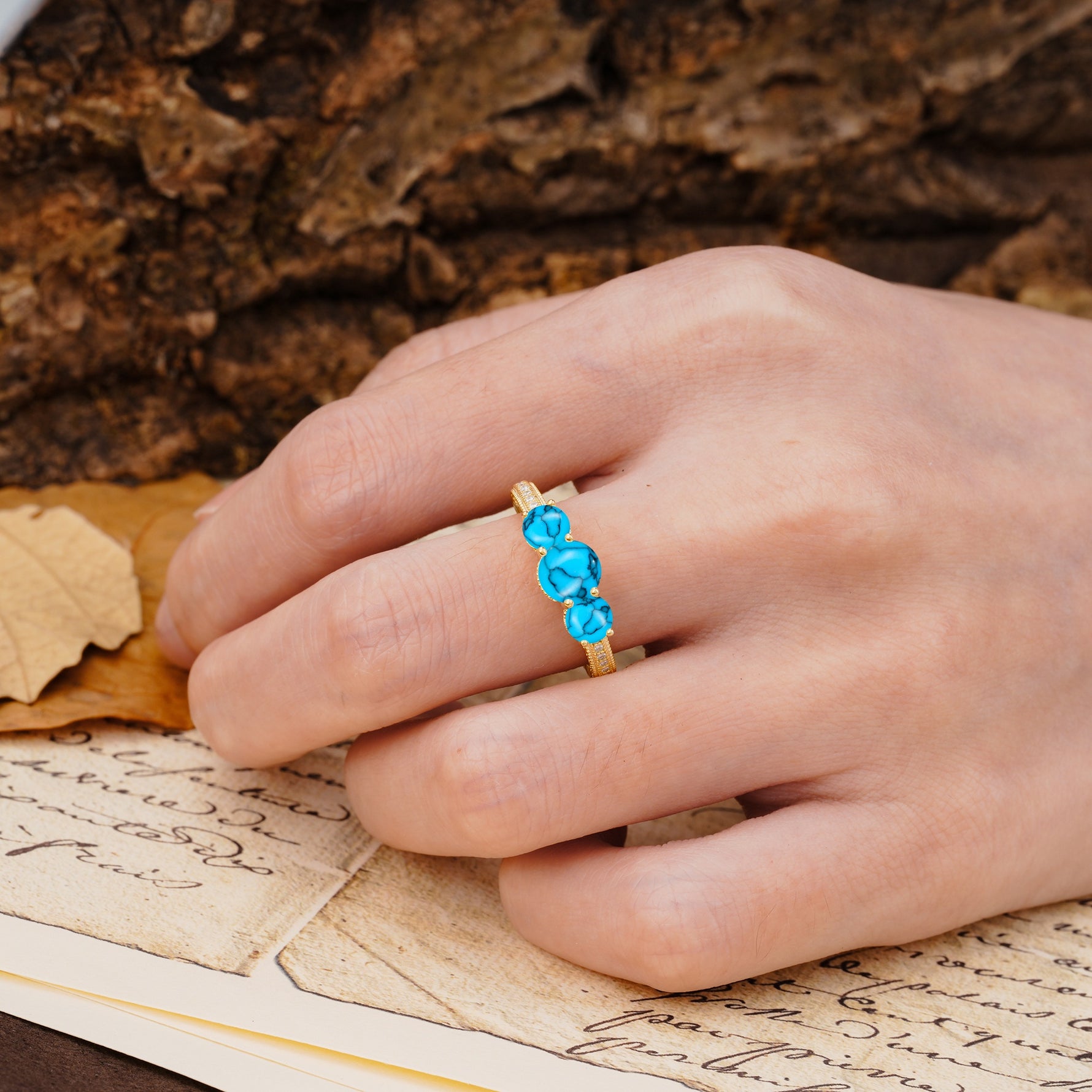 Classic Simplicity 4-Prong Round Cut Turquoise Three Stones Wedding Ring - Additional view