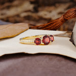 Classic Simplicity 4-Prong Round Cut Garnet Three Stones Wedding Ring - Additional view