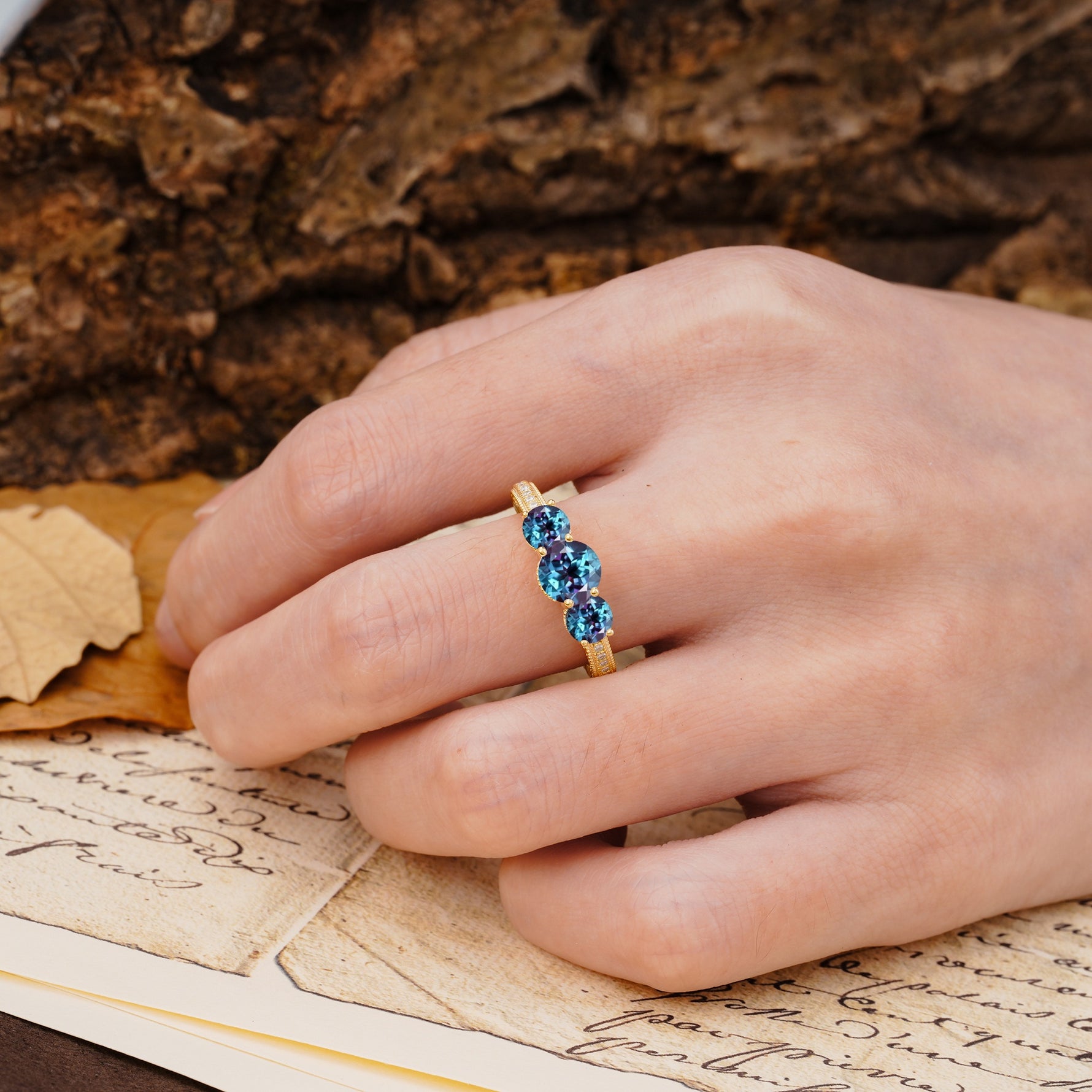 Classic Simplicity 4-Prong Round Cut Alexandrite Three Stones Wedding Ring - Additional view