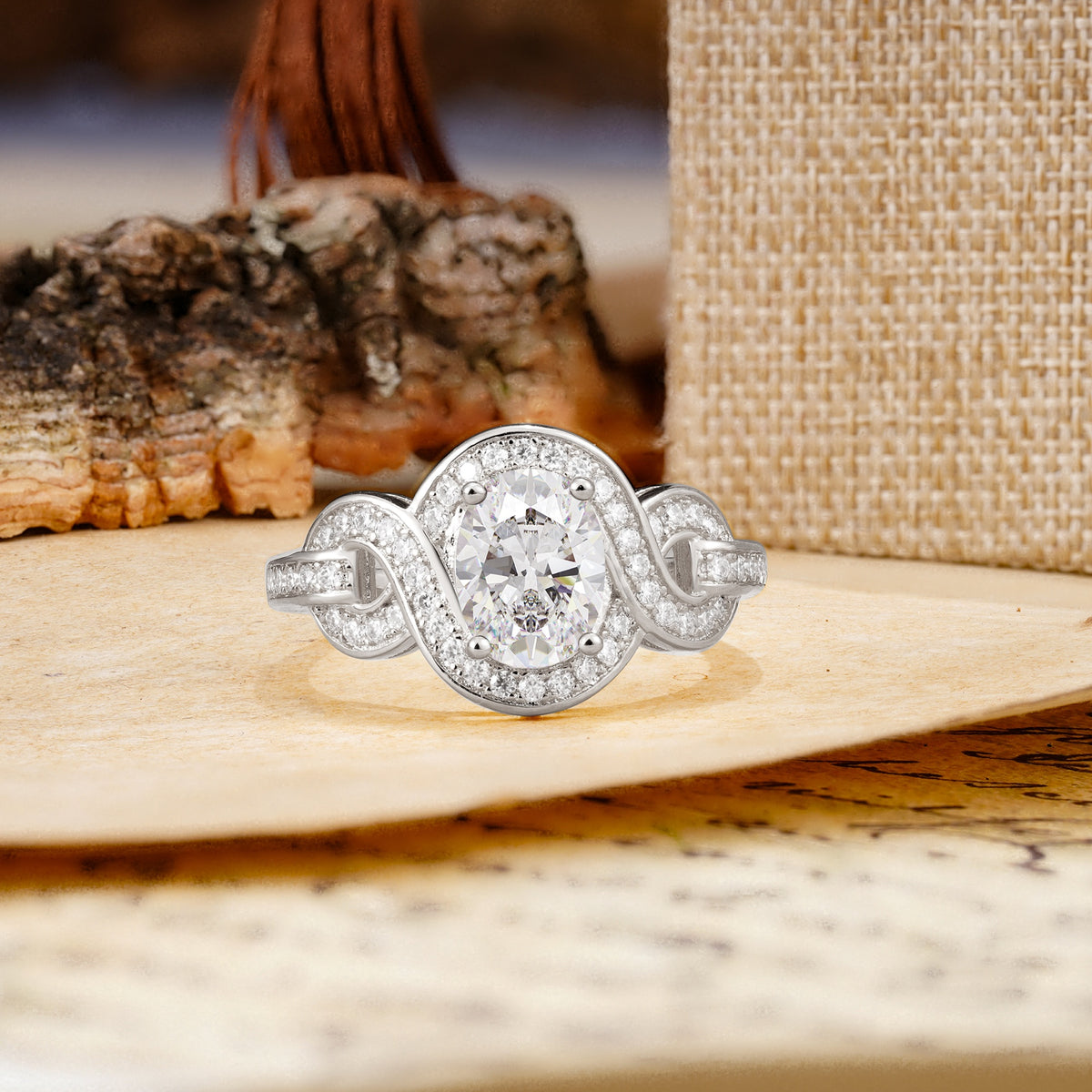 Luxurious Vintage-Style Twisted 4-Prong Oval Cut Moissanite Engagement Ring - Additional view