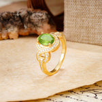 Luxurious Vintage-Style Twisted 4-Prong Oval Cut Peridot Engagement Ring - Additional view
