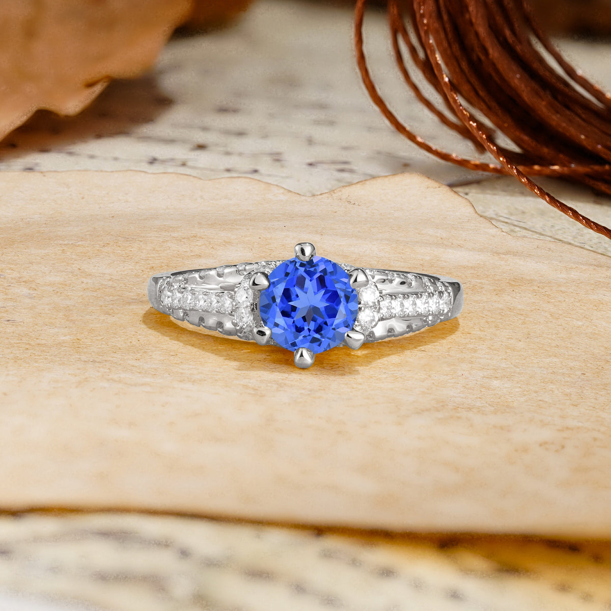 Timeless ClassicRound Cut Sapphire Side Stone Engagement Ring - Additional view