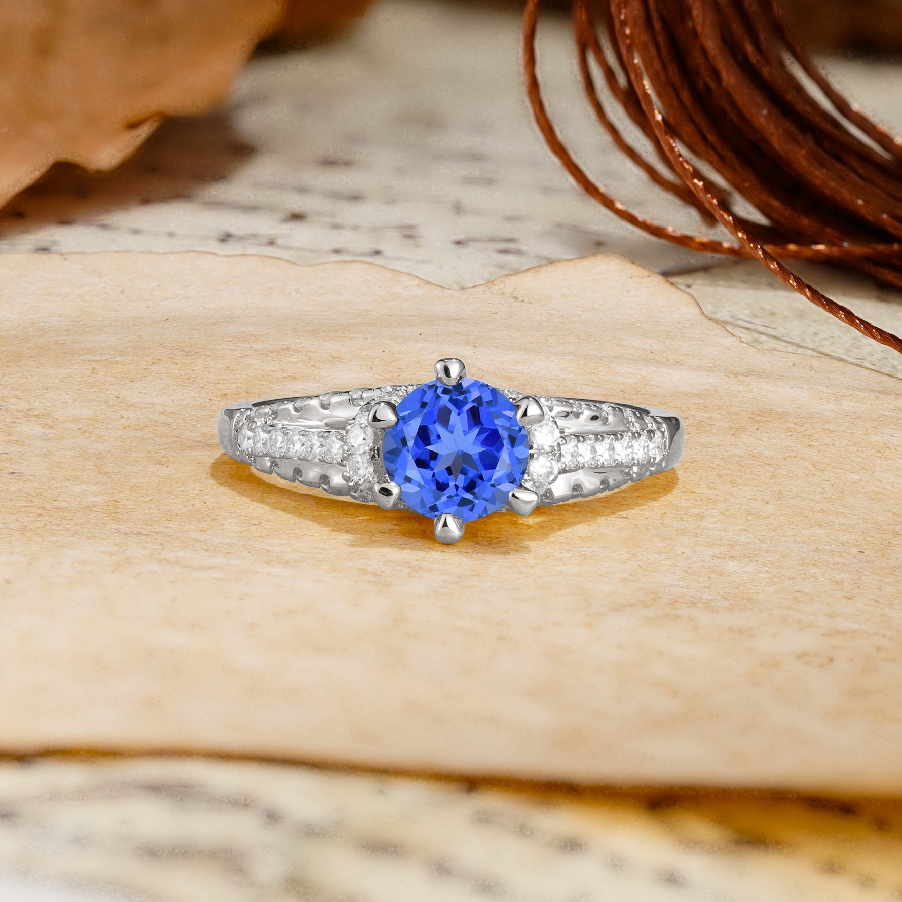 Timeless ClassicRound Cut Sapphire Side Stone Engagement Ring - Additional view