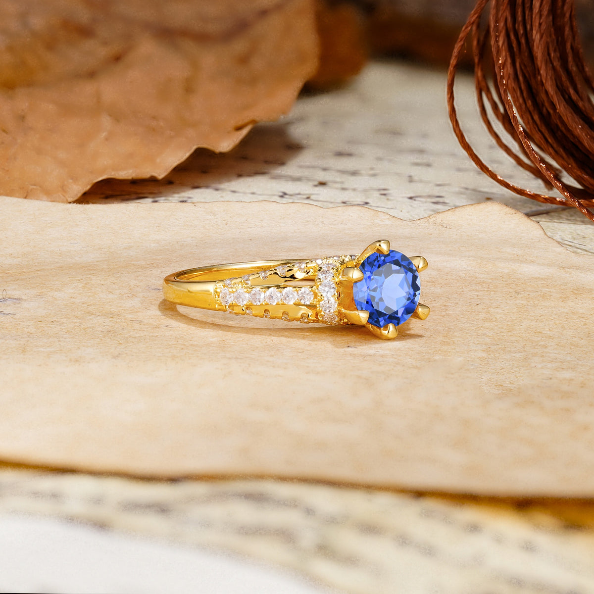 Timeless ClassicRound Cut Sapphire Side Stone Engagement Ring - Additional view