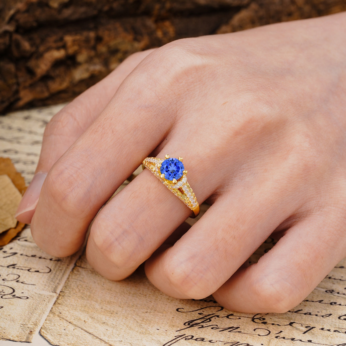 Timeless ClassicRound Cut Sapphire Side Stone Engagement Ring - Additional view