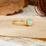 Timeless ClassicRound Cut Fire Opal Side Stone Engagement Ring - Additional view
