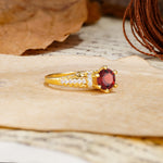 Timeless ClassicRound Cut Garnet Side Stone Engagement Ring - Additional view