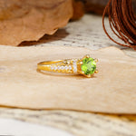 Timeless ClassicRound Cut Peridot Side Stone Engagement Ring - Additional view