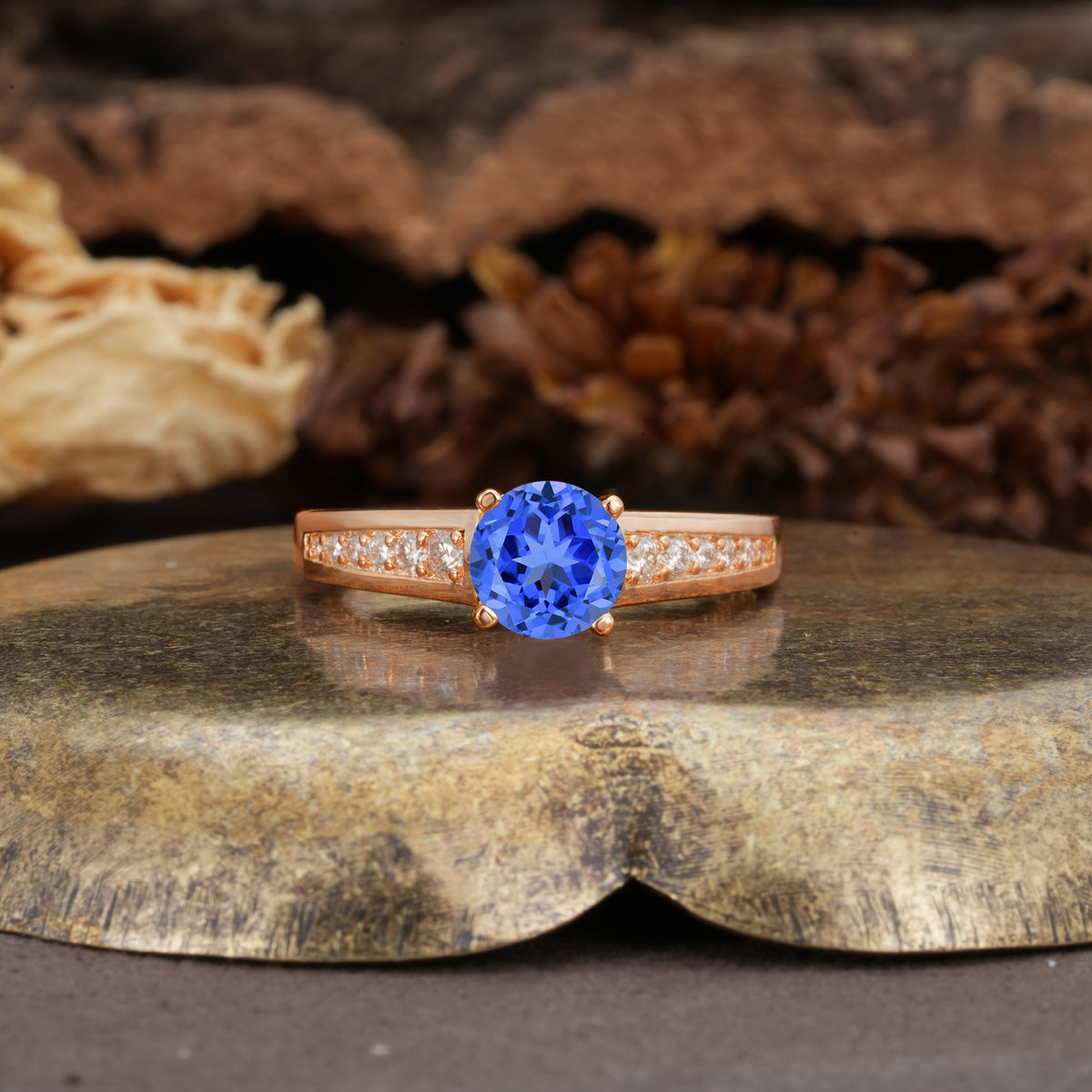 Retro-Minimalist 4-Prong Round Cut Sapphire Engagement Ring - Additional view