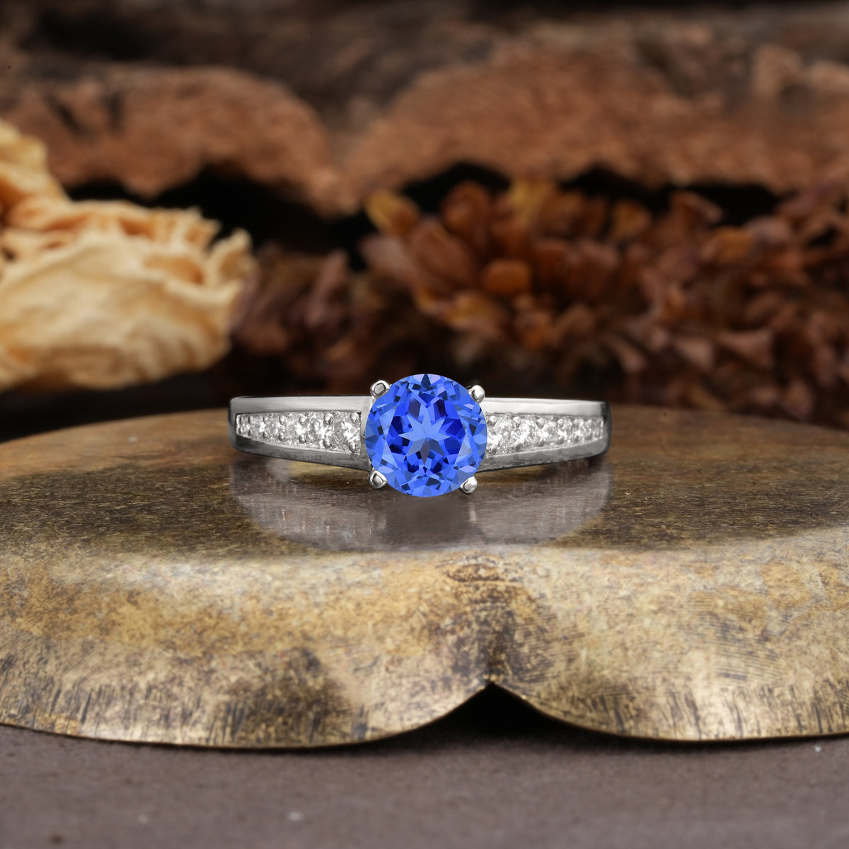 Retro-Minimalist 4-Prong Round Cut Sapphire Engagement Ring - Additional view