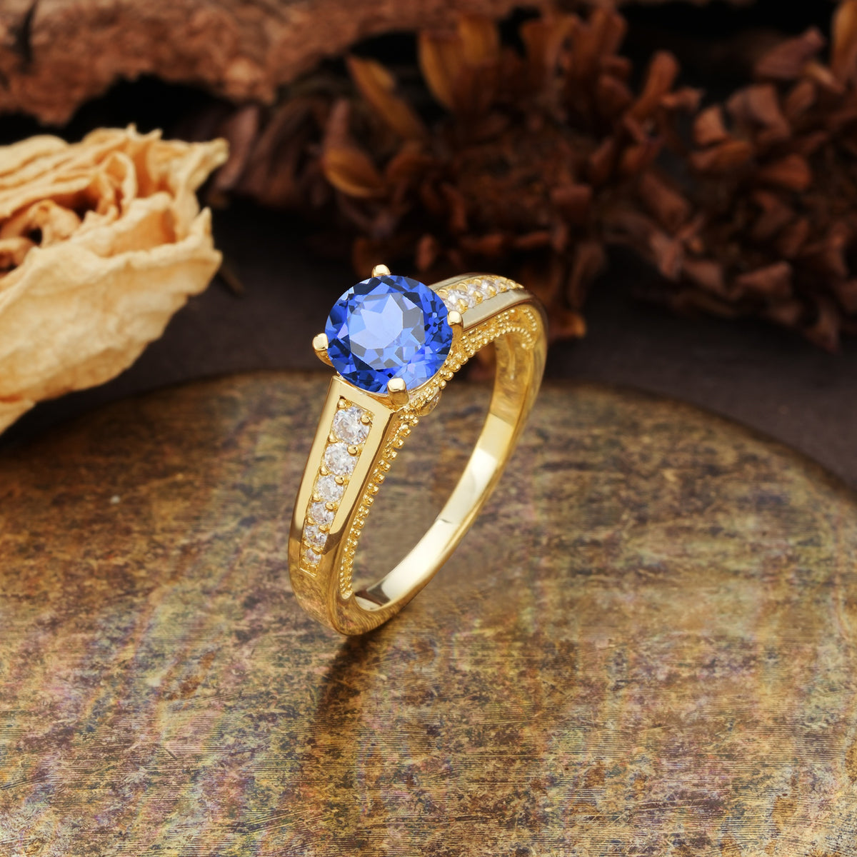 Retro-Minimalist 4-Prong Round Cut Sapphire Engagement Ring - Additional view