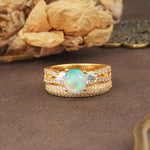 Luxurious and Unique 4-Prong Round Cut Fire Opal Bridal Ring Set - Yellow-Gold