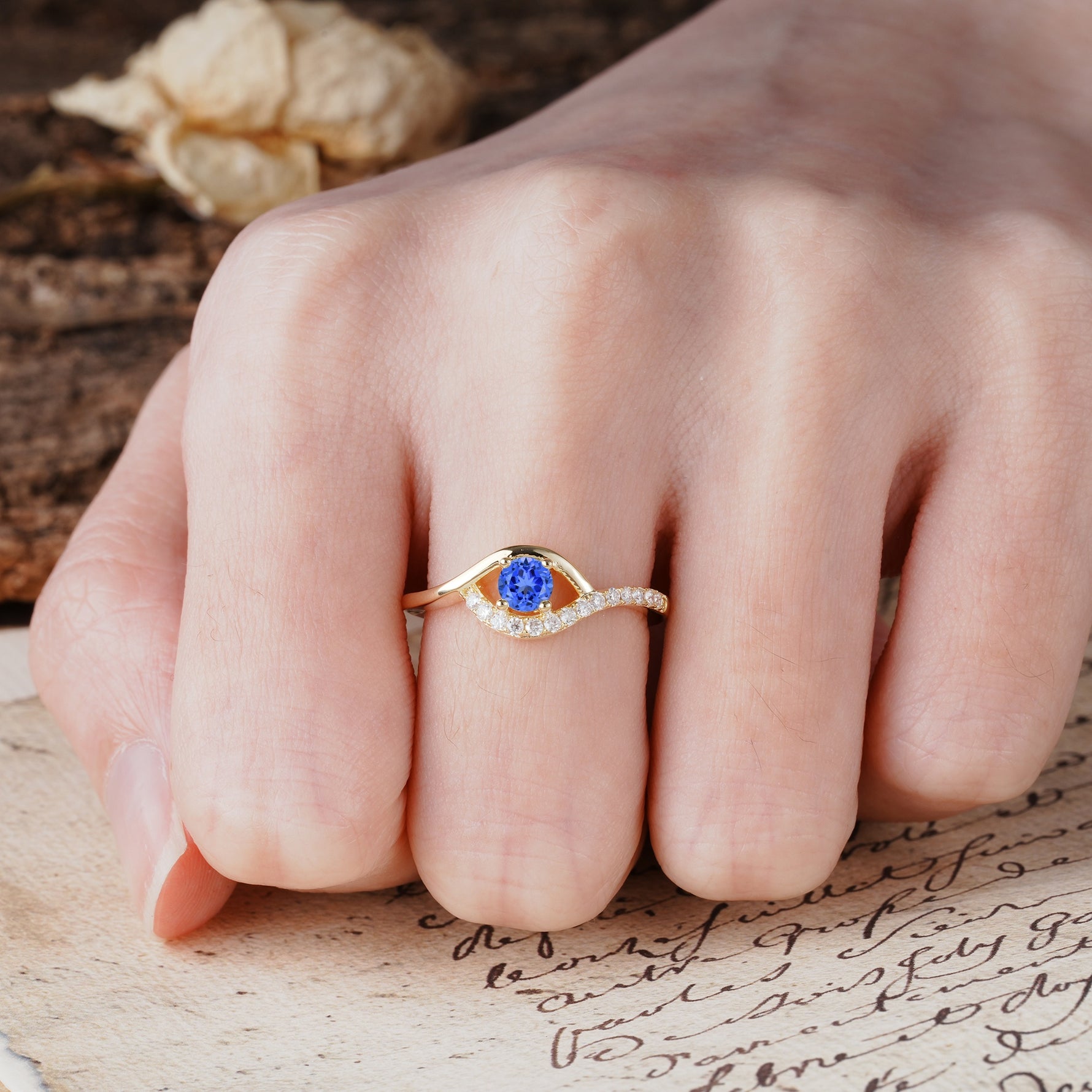 Unique Demon Eye 4-Prong Round Cut Sapphire Engagement Ring - Additional view
