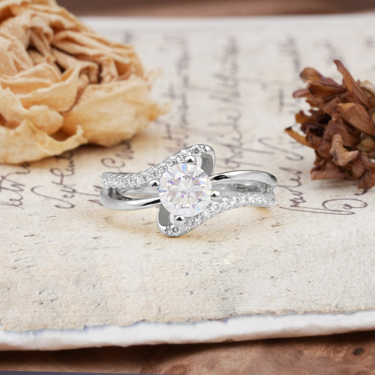 Uniquely Elegant, Twisting 4-Prong Round Cut Moissanite Engagement Ring - Additional view