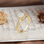 Uniquely Elegant, Twisting 4-Prong Round Cut Moissanite Engagement Ring - Additional view