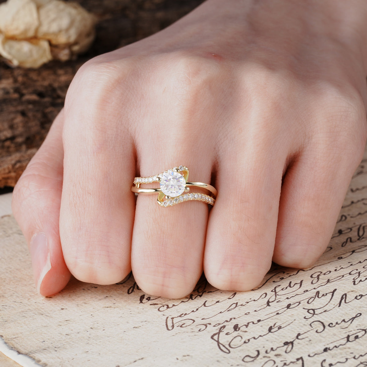 Uniquely Elegant, Twisting 4-Prong Round Cut Moissanite Engagement Ring - Additional view