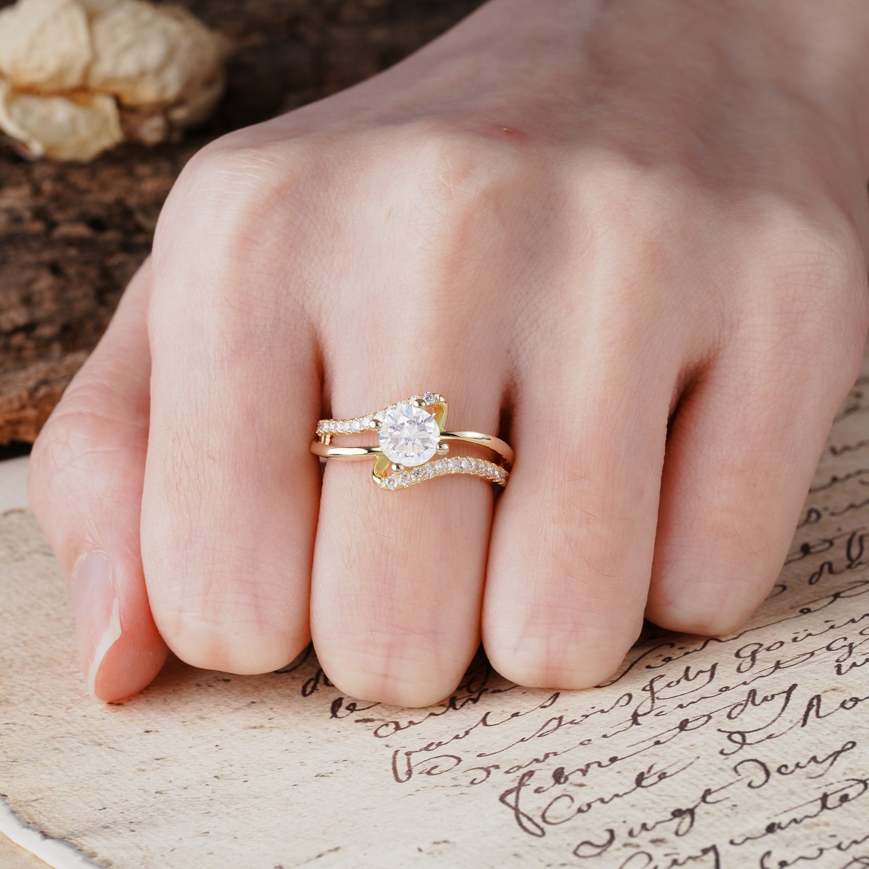 Uniquely Elegant, Twisting 4-Prong Round Cut Moissanite Engagement Ring - Additional view
