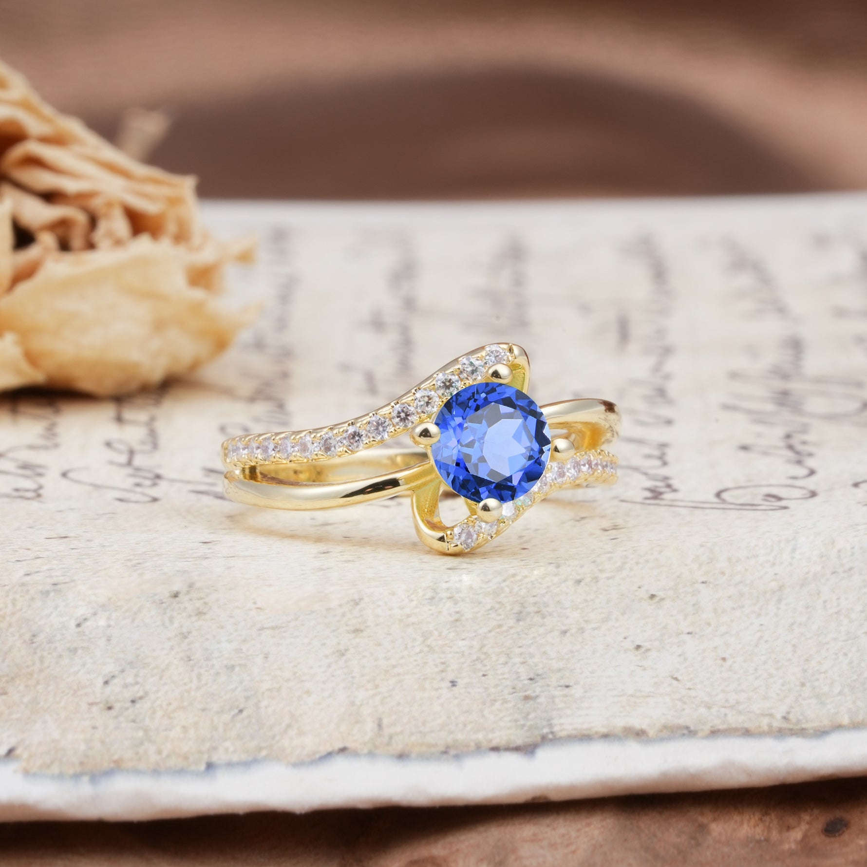 Uniquely Elegant, Twisting 4-Prong Round Cut Sapphire Engagement Ring - Additional view
