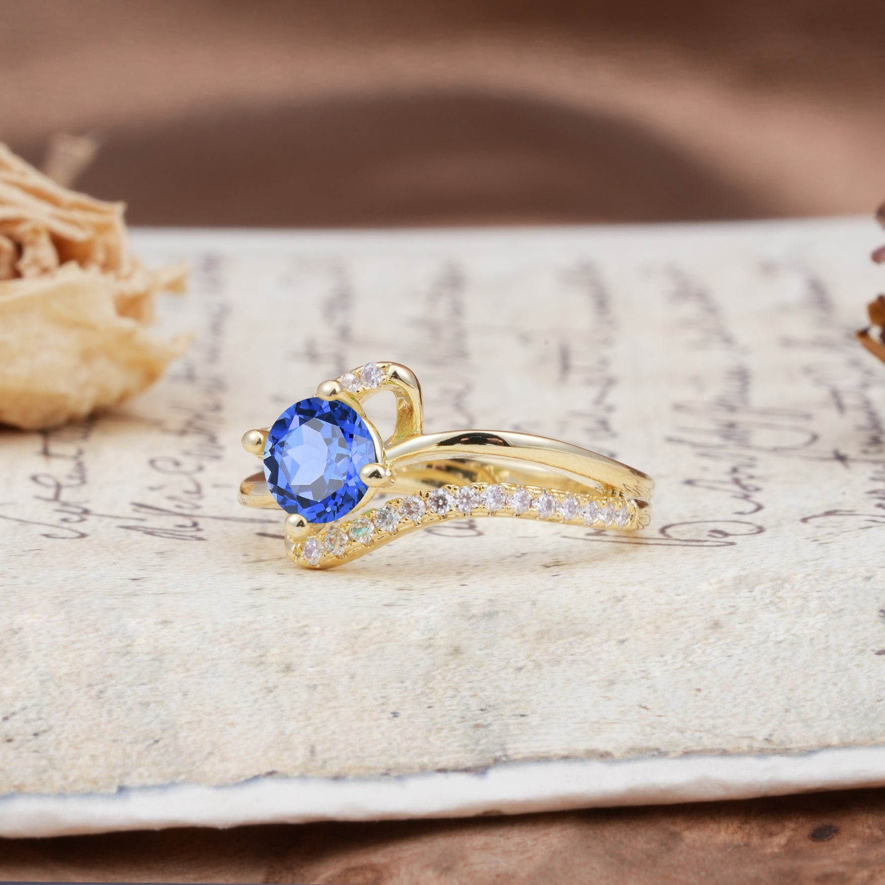 Uniquely Elegant, Twisting 4-Prong Round Cut Sapphire Engagement Ring - Additional view