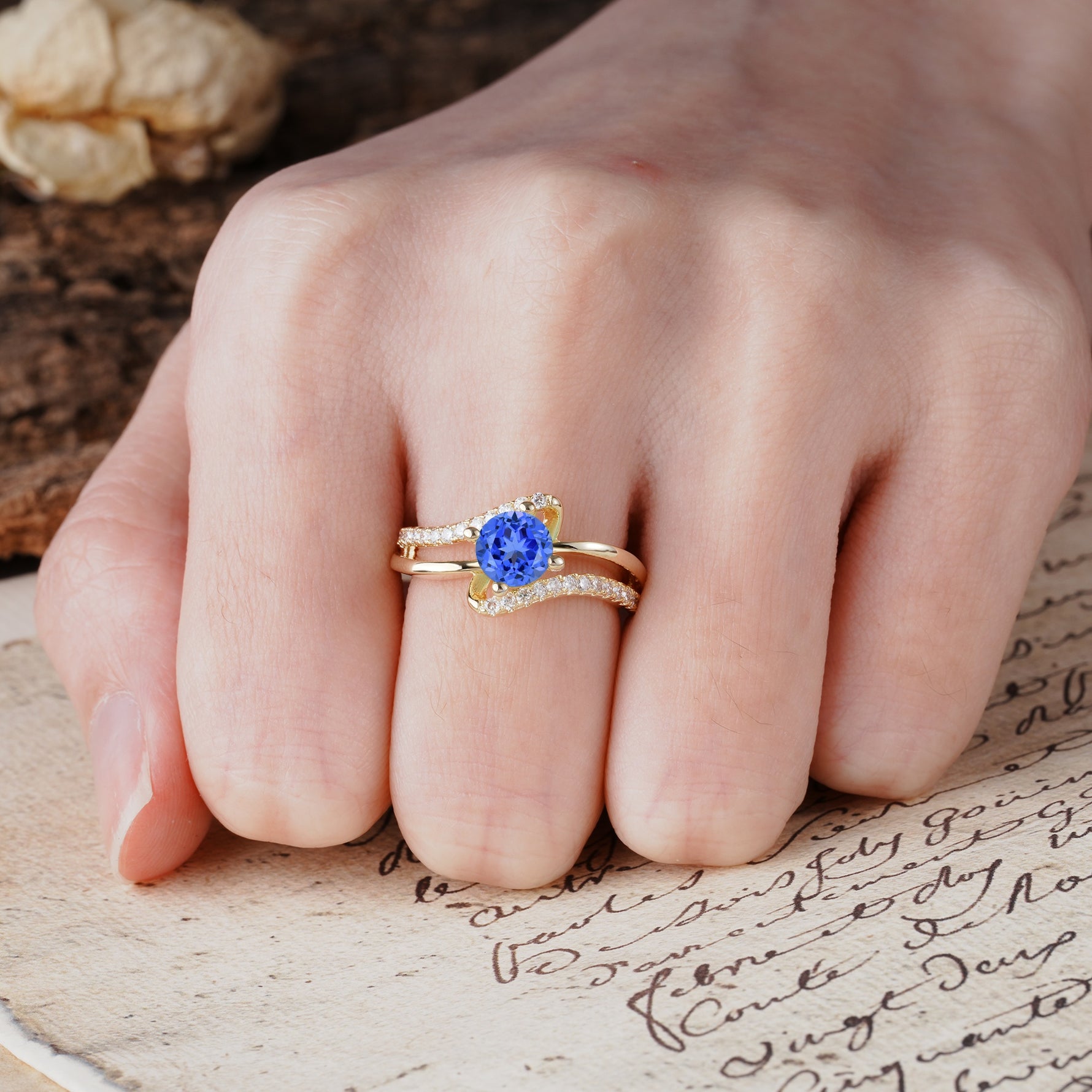 Uniquely Elegant, Twisting 4-Prong Round Cut Sapphire Engagement Ring - Additional view