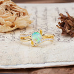 Uniquely Elegant, Twisting 4-Prong Round Cut Fire Opal Engagement Ring - Additional view