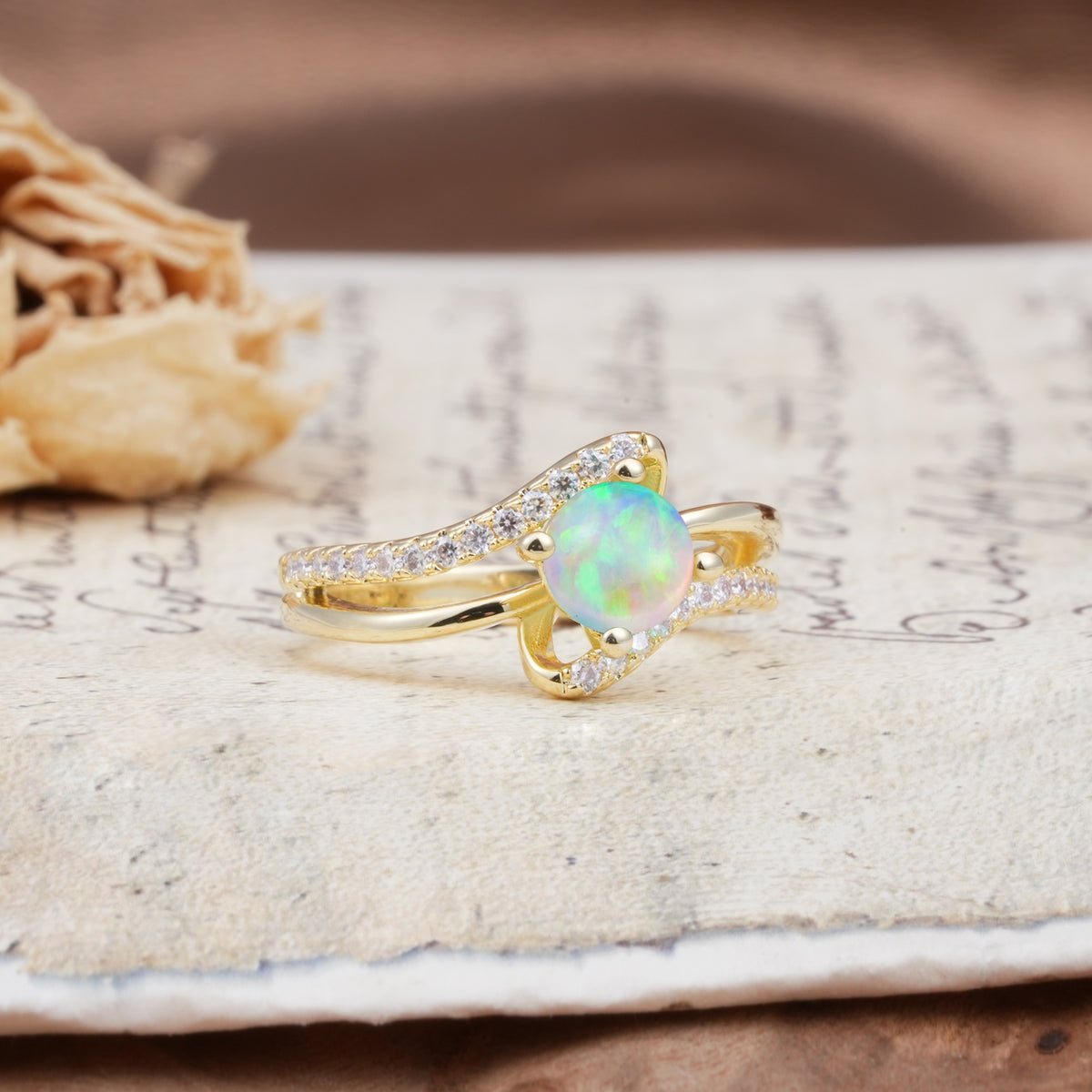 Uniquely Elegant, Twisting 4-Prong Round Cut Fire Opal Engagement Ring - Additional view