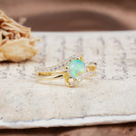 Uniquely Elegant, Twisting 4-Prong Round Cut Fire Opal Engagement Ring - Additional view