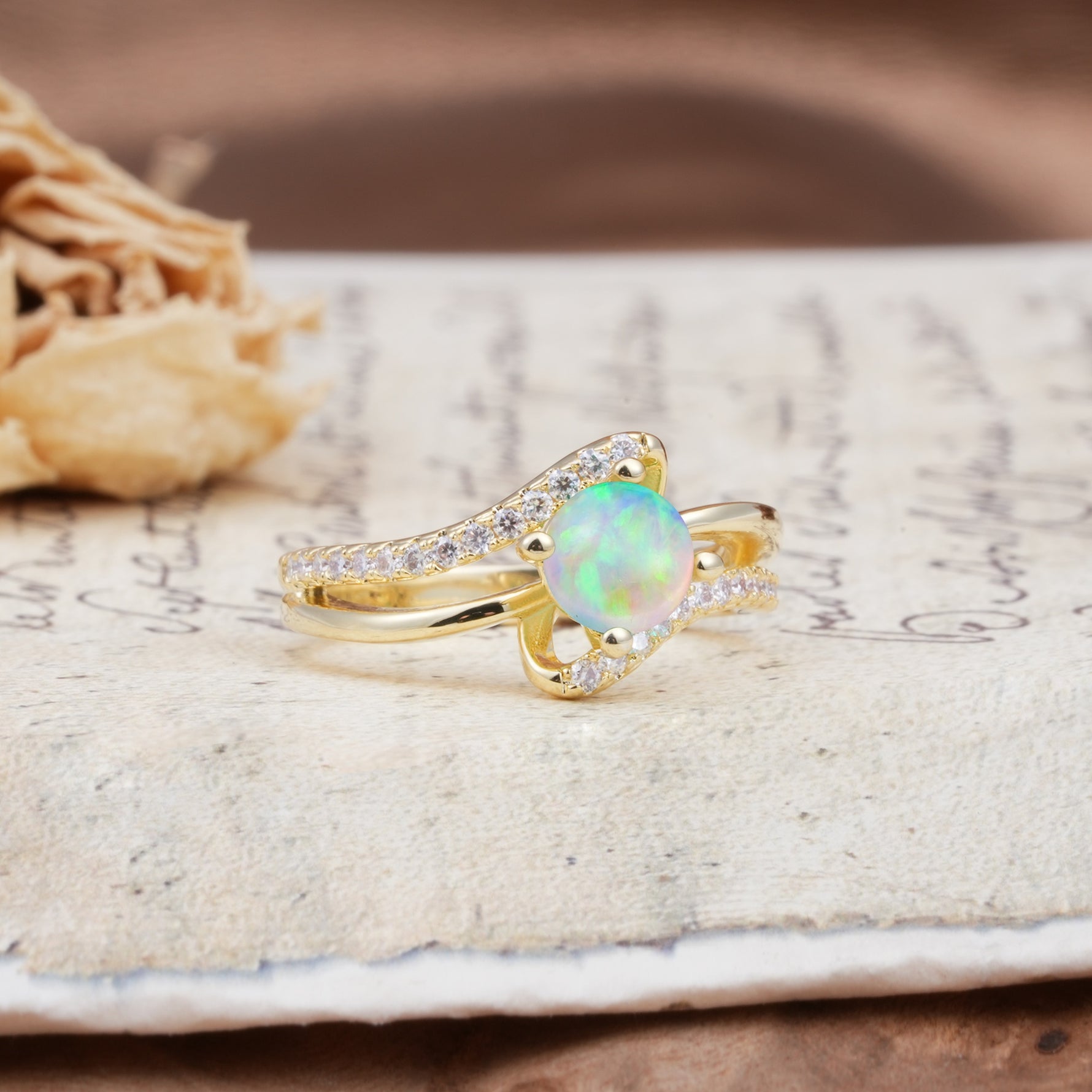 Uniquely Elegant, Twisting 4-Prong Round Cut Fire Opal Engagement Ring - Additional view