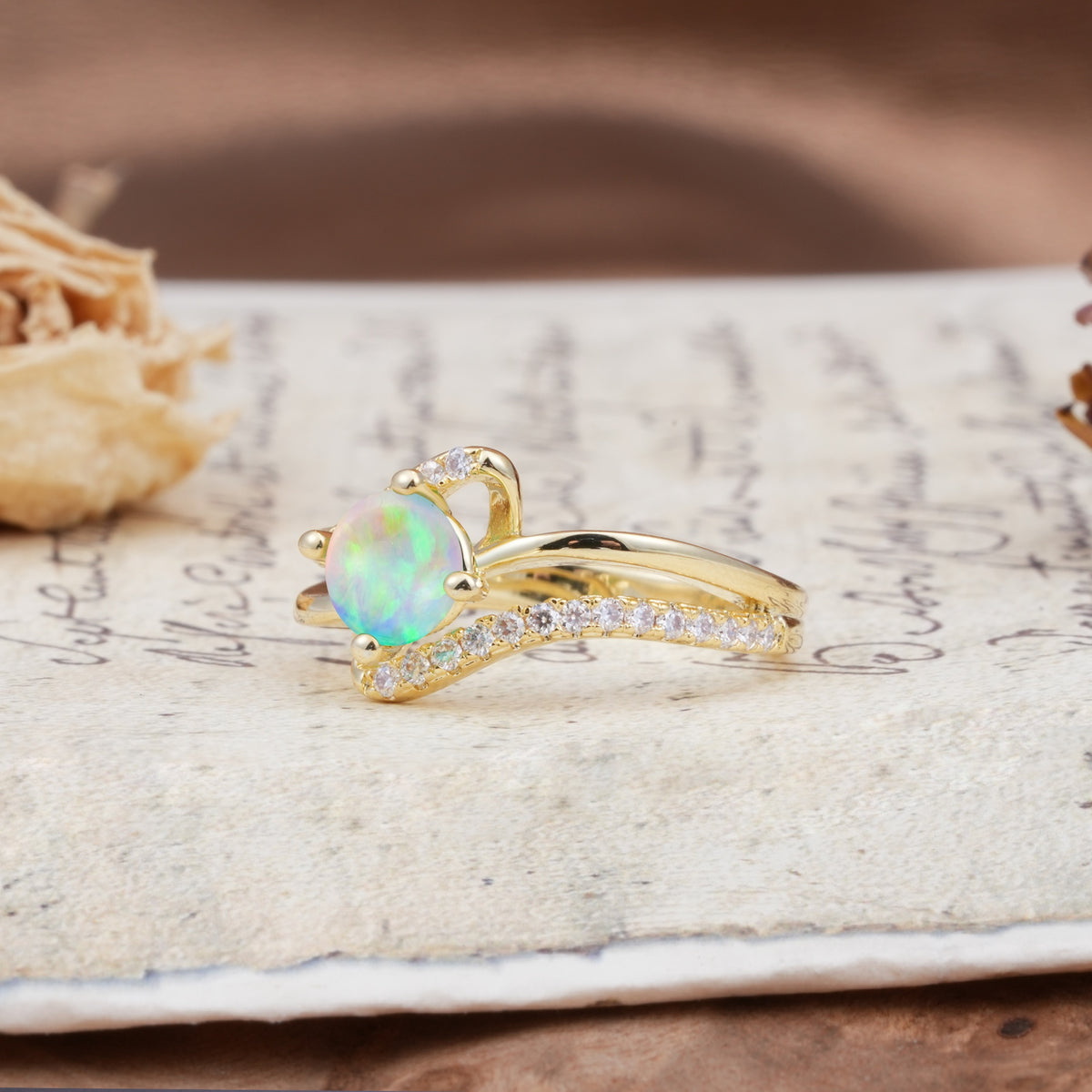 Uniquely Elegant, Twisting 4-Prong Round Cut Fire Opal Engagement Ring - Additional view