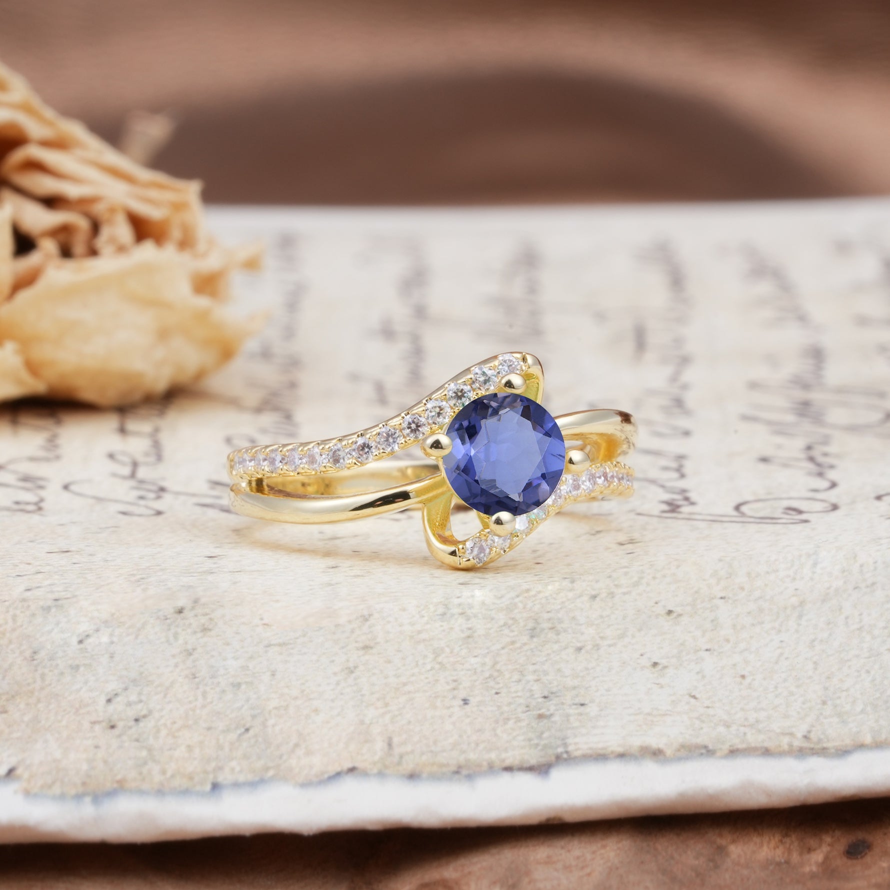 Uniquely Elegant, Twisting 4-Prong Round Cut Tanzanite Engagement Ring - Additional view