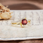 Uniquely Elegant, Twisting 4-Prong Round Cut Garnet Engagement Ring - Additional view