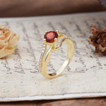 Uniquely Elegant, Twisting 4-Prong Round Cut Garnet Engagement Ring - Additional view