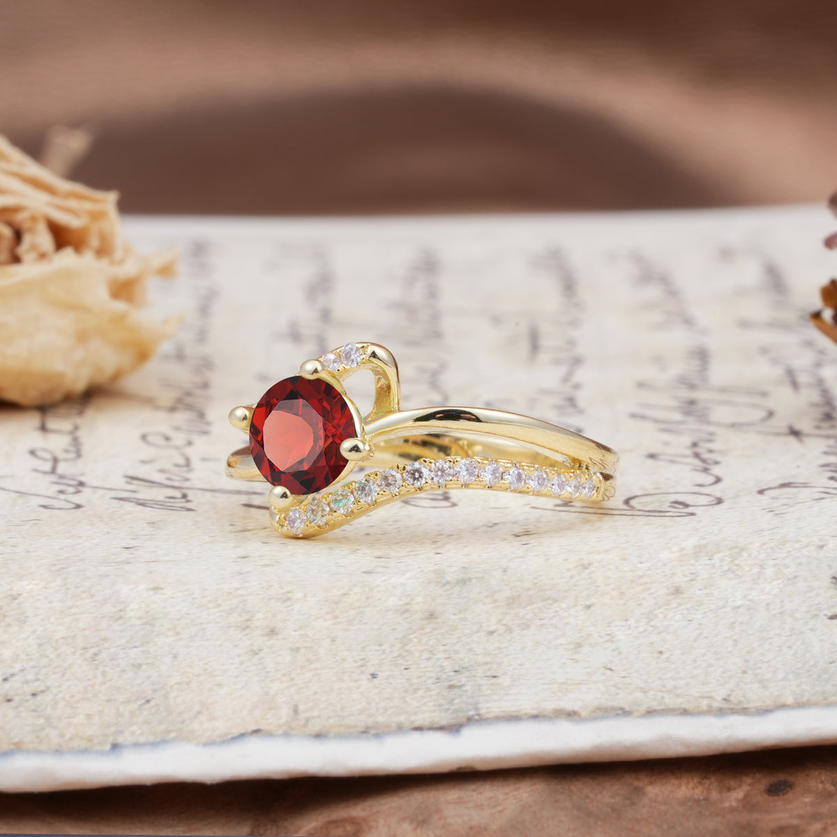 Uniquely Elegant, Twisting 4-Prong Round Cut Garnet Engagement Ring - Additional view