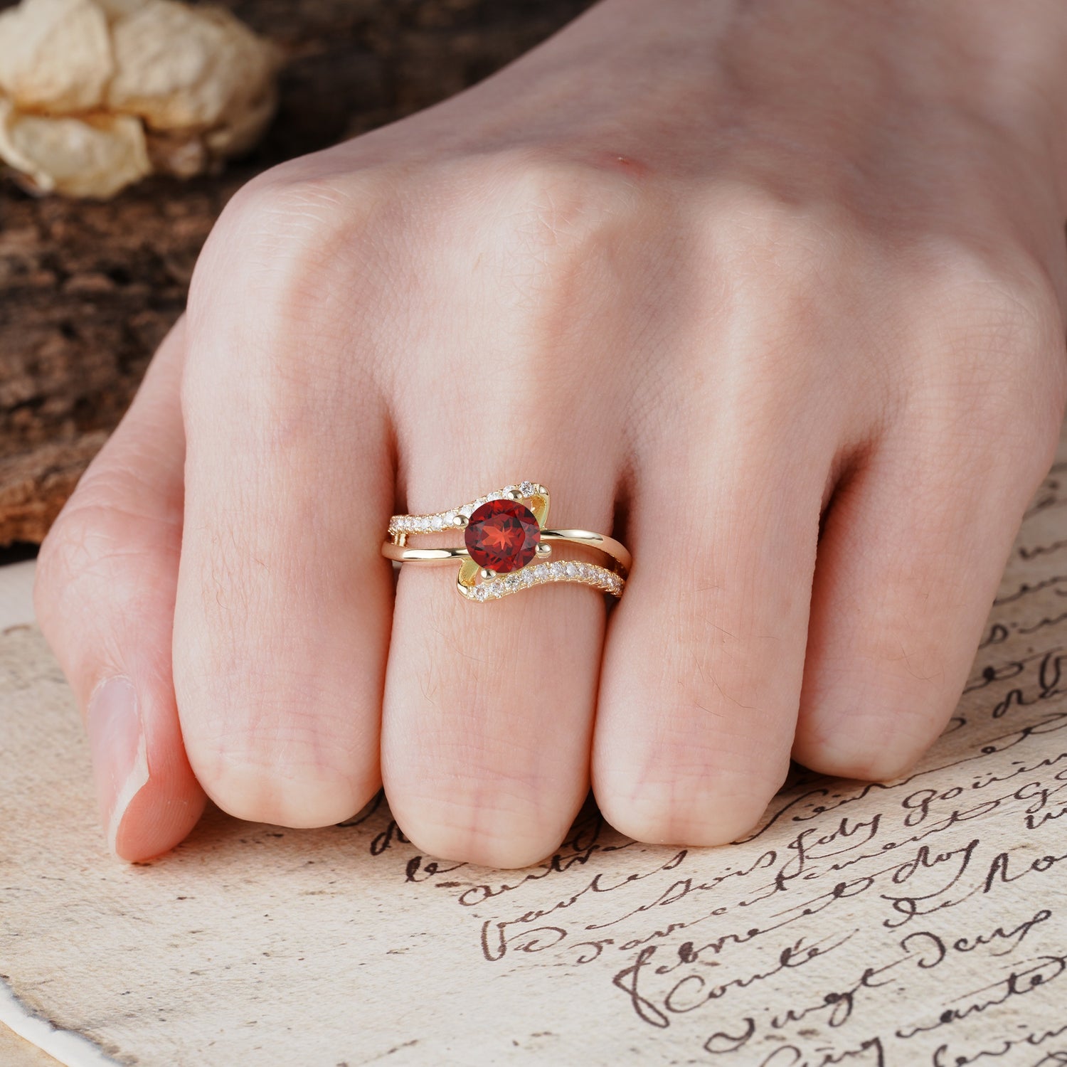 Uniquely Elegant, Twisting 4-Prong Round Cut Garnet Engagement Ring - Additional view