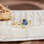 Uniquely Elegant, Twisting 4-Prong Round Cut Alexandrite Engagement Ring - Additional view