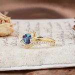 Uniquely Elegant, Twisting 4-Prong Round Cut Alexandrite Engagement Ring - Additional view