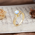 Uniquely Elegant, Twisting 4-Prong Round Cut Moonstone Engagement Ring - Additional view