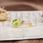 Uniquely Elegant, Twisting 4-Prong Round Cut Peridot Engagement Ring - Additional view