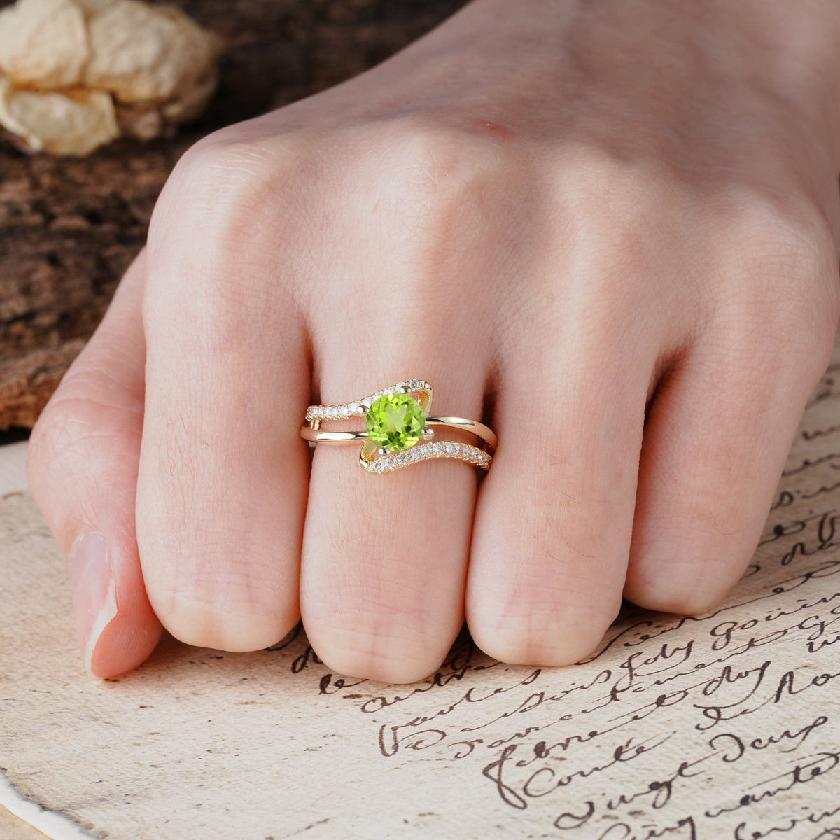Uniquely Elegant, Twisting 4-Prong Round Cut Peridot Engagement Ring - Additional view