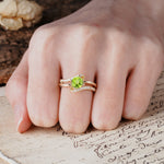 Uniquely Elegant, Twisting 4-Prong Round Cut Peridot Engagement Ring - Additional view