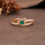 Unique Twisted Heart-Shaped 3-Prong Round Cut Emerald Engagement Ring - Additional view