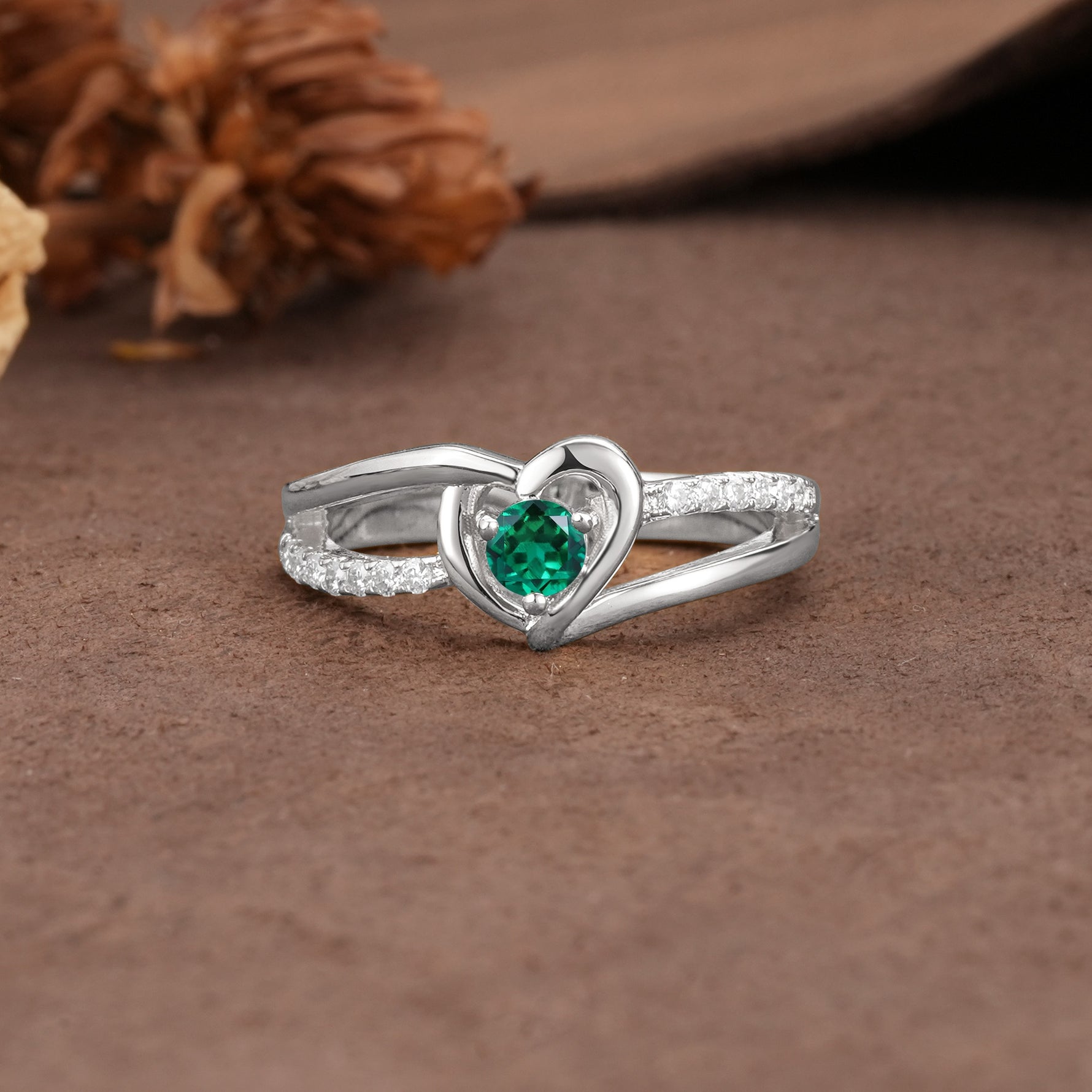 Unique Twisted Heart-Shaped 3-Prong Round Cut Emerald Engagement Ring - Additional view