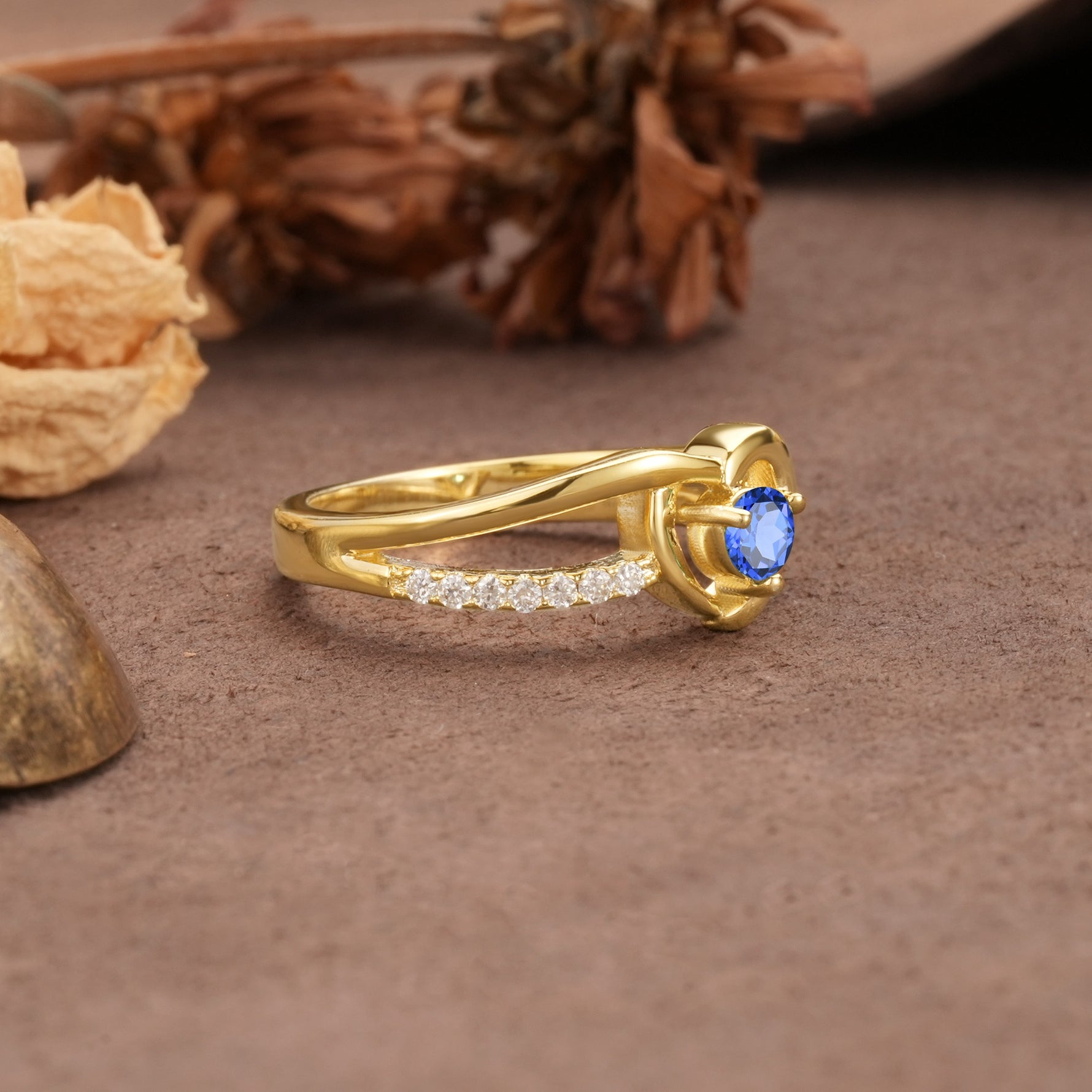 Unique Twisted Heart-Shaped 3-Prong Round Cut Sapphire Engagement Ring - Additional view