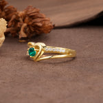 Unique Twisted Heart-Shaped 3-Prong Round Cut Emerald Engagement Ring - Additional view